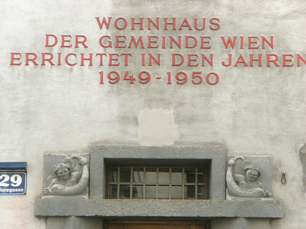 Portal with reliefs "Children and Dolphins"