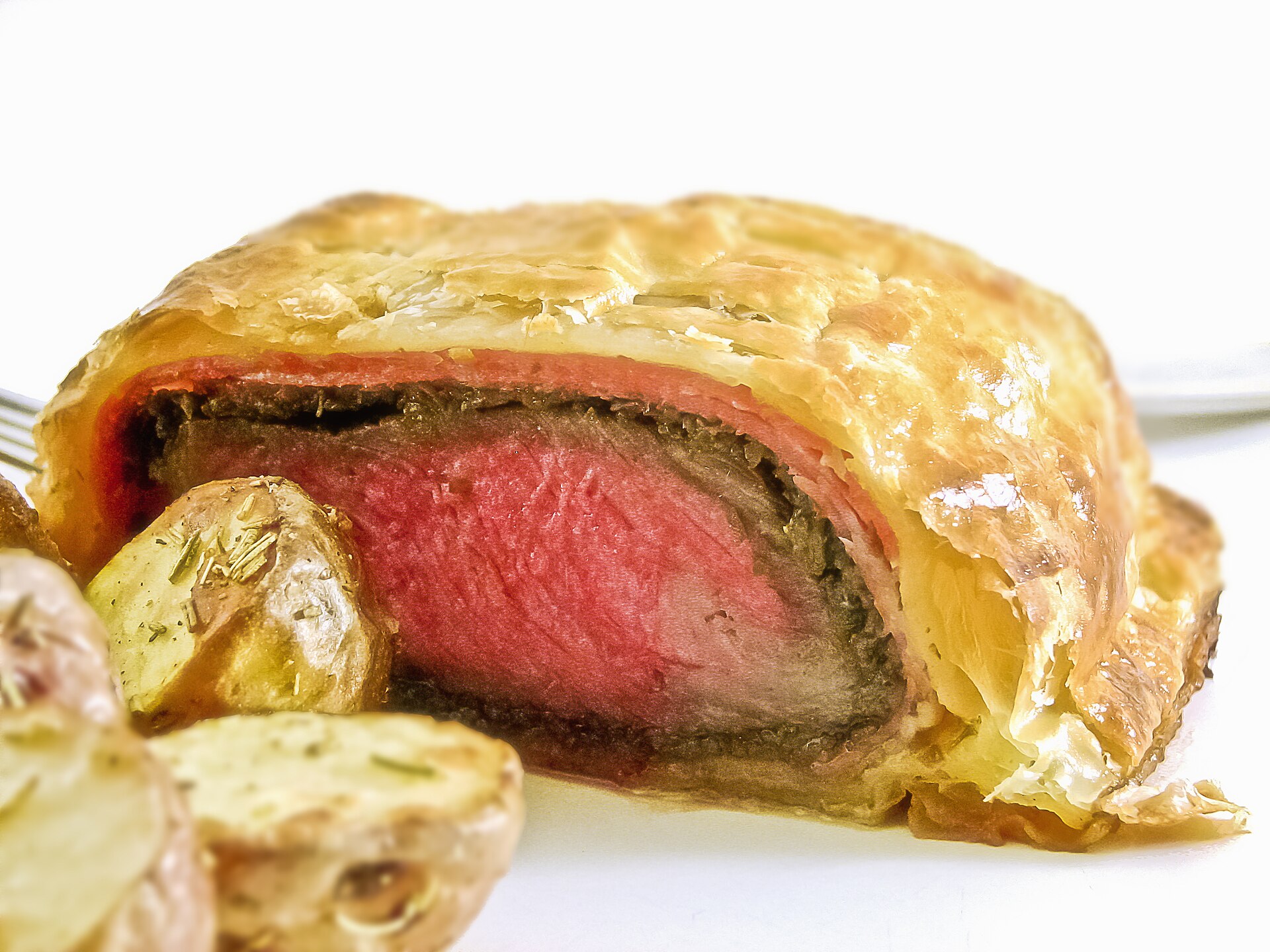 Beef Wellington with girolles and Lardo di Colonnata — representative photo